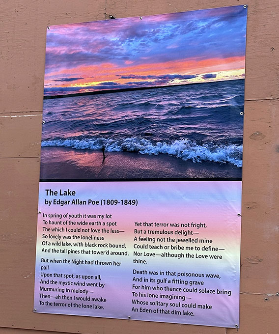 Printed banner of a beach sunset with poetry