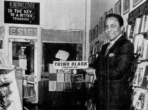 Old newspaper Photo of man in Vaughn's Bookstore