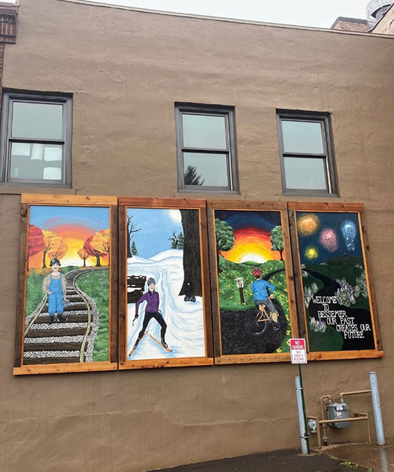 Photo of Welcome to Bessemer mural on the wall of a building